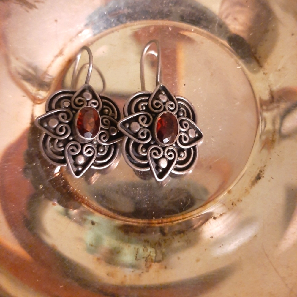 Silver Celtic style earrings with red stone